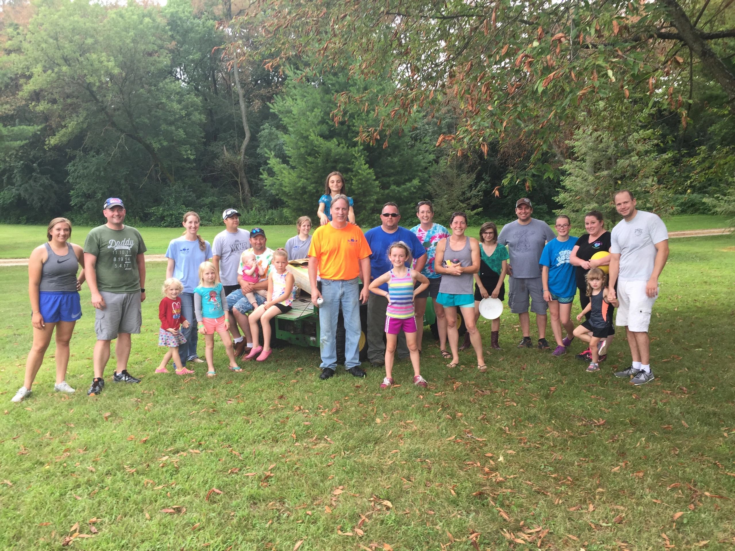 A gathering on the camp lawn